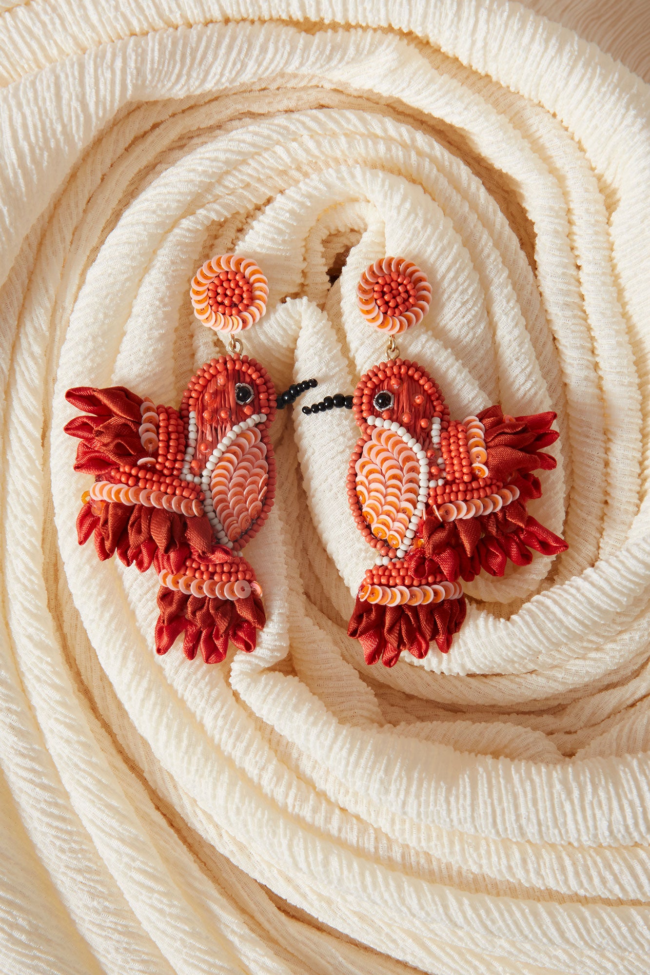 PENDIENTES MIRA ROJO
